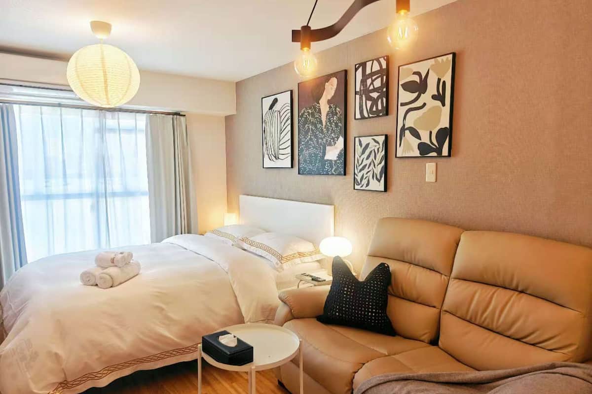 Deluxe Studio, Balcony, City View | Desk, laptop workspace, iron/ironing board, free WiFi