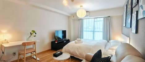 Deluxe Studio, Balcony, City View | Desk, laptop workspace, iron/ironing board, free WiFi