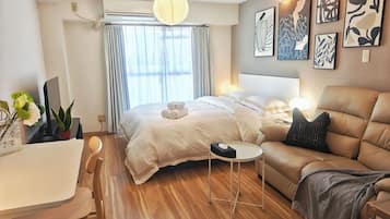 Deluxe Studio, Balcony, City View | Desk, laptop workspace, iron/ironing board, free WiFi