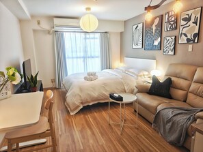 Deluxe Studio, Balcony, City View | Desk, laptop workspace, iron/ironing board, free WiFi - Sidihome 365 Apartment (Osaka)