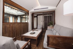 Executive-sviitti | Ylelliset vuodevaatteet, untuvapeitot, yksilöllisesti sisustettu