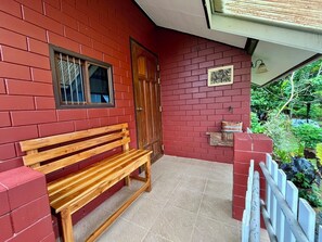 Habitación clásica, vista al jardín, en el área del patio | Terraza o patio
