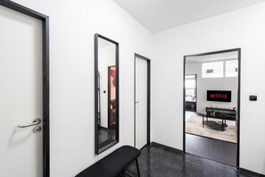 Deluxe Apartment, Balcony, City View | Living area | 49-inch Smart TV with digital channels, Netflix, streaming services