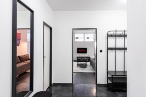 Deluxe Apartment, Balcony, City View | Living area | 49-inch Smart TV with digital channels, Netflix, streaming services