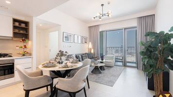 Luxury Apartment, Balcony, Canal View | In-room dining