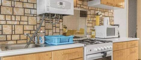 Apartment | Private kitchen | Fridge, microwave, oven, stovetop