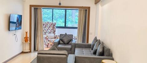 32-inch flat-screen TV with cable channels