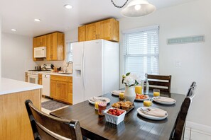 Enjoy seamless transitions from dining to the kitchen area. - Beach Home with Open Living & Walkability to Abbot Kinney | Venice Drift (Los Angeles)