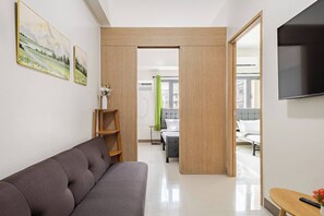 Condo, 2 Bedrooms, Private Pool | Living room - Near SM BF & Shopwise Slex Accessible 2BR for 4 (Parañaque)