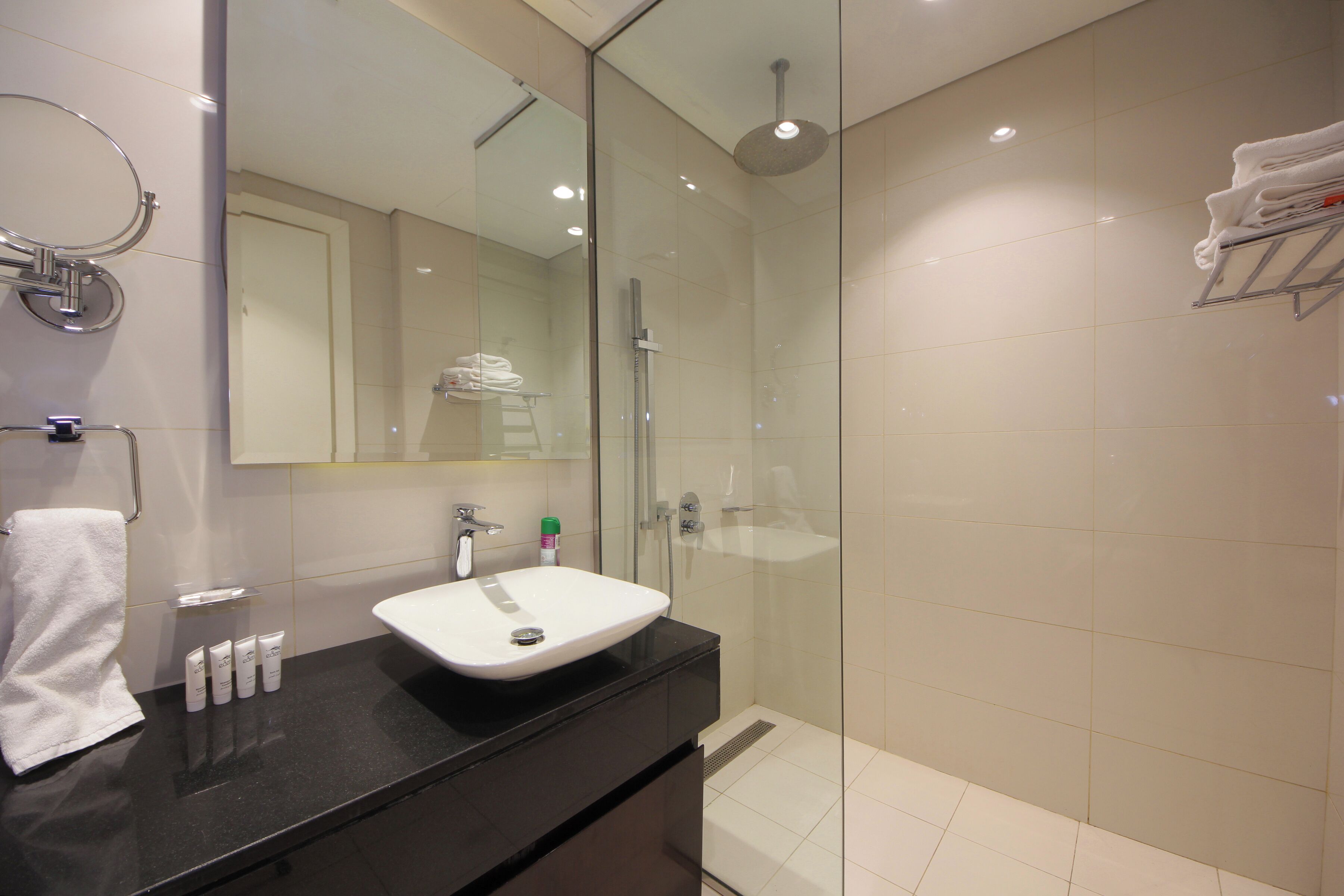 Luxury Studio Suite, City View | Bathroom | Shower, free toiletries, hair dryer, towels