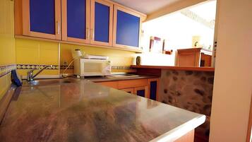 Fridge, microwave, coffee/tea maker, spices