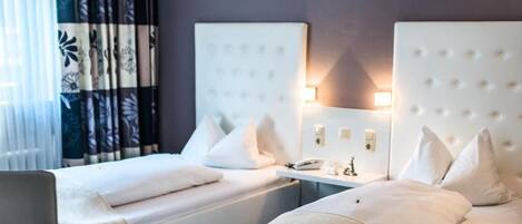 Dobbelt- eller tomannsrom | Safe på rommet, lydisolert, strykejern/-brett og wi-fi (inkludert)