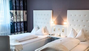 Doppel- oder Zweibettzimmer | Zimmersafe, schallisolierte Zimmer, Bügeleisen/Bügelbrett