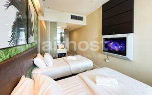 Habitación con 1 cama matrimonial o 2 individuales, vista a la ciudad | Tabla de planchar con plancha y wifi gratis 