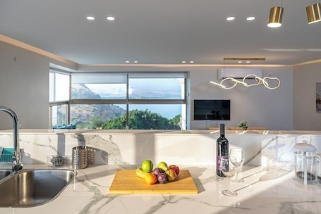 Electric kettle. Luxury apartment with panoramic view
