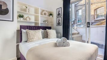 2 bedrooms, desk, iron/ironing board, travel cot