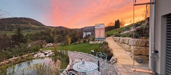 3 room apartment Villa Sonnglück by the natural swimming pond in the Swiss hiking Jura