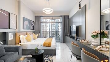 Estudio, balcón, vista a la ciudad | Cunas, wifi gratis y ropa de cama