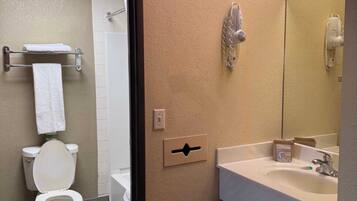 Standard Room, 1 King Bed, Non Smoking | Bathroom | Separate tub and shower, towels, toilet paper