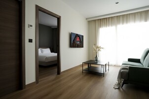 Apartment, 1 Bedroom, Balcony | Living area | Smart TV