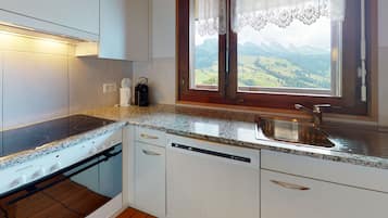 Classic Condo, 2 Bedrooms, Balcony | Private kitchen | Electric kettle, highchair