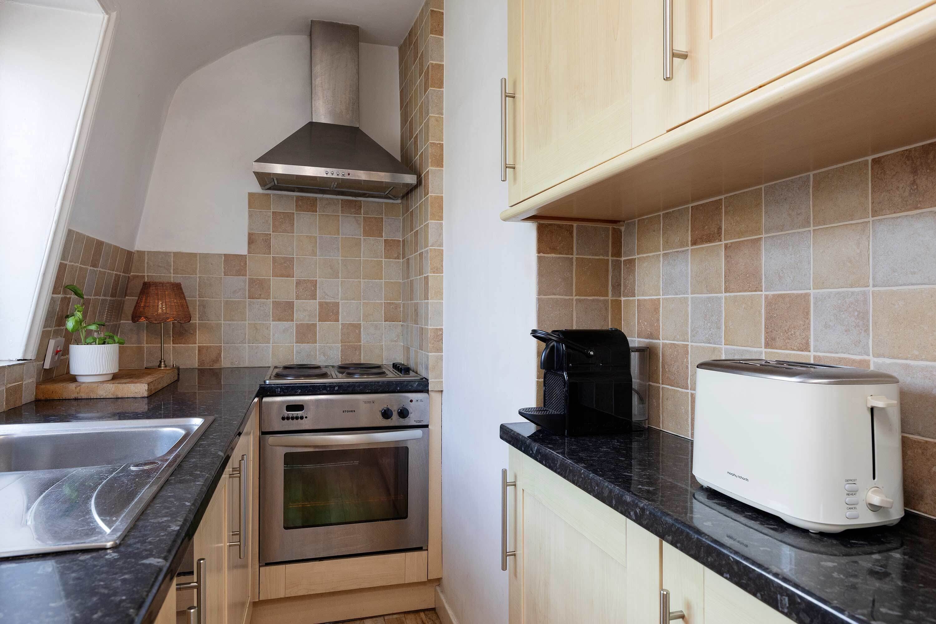 Fridge, microwave, toaster, cookware/dishes/utensils