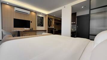 Blackout curtains, iron/ironing board, free WiFi, bed sheets