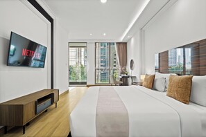 Apartment, 1 Bedroom, City View | Desk, laptop workspace, iron/ironing board, free WiFi - Malven by Kozystay - SCBD (Jakarta)