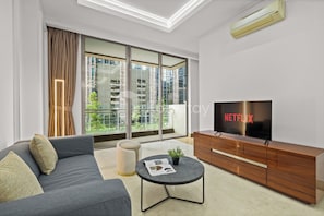 Apartment, 1 Bedroom, City View | Living room | Smart TV, Netflix, streaming services - Malven by Kozystay - SCBD (Jakarta)