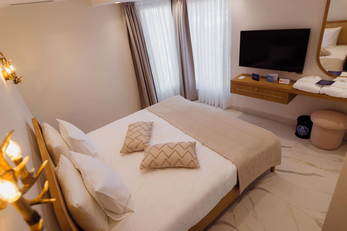 Standard Double Room, City View | In-room safe, desk, laptop workspace, blackout drapes