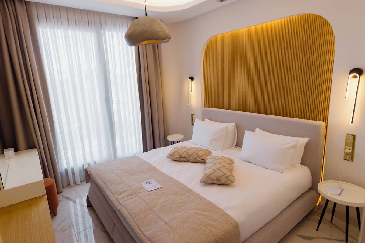 Luxury Suite, City View | In-room safe, desk, laptop workspace, blackout drapes