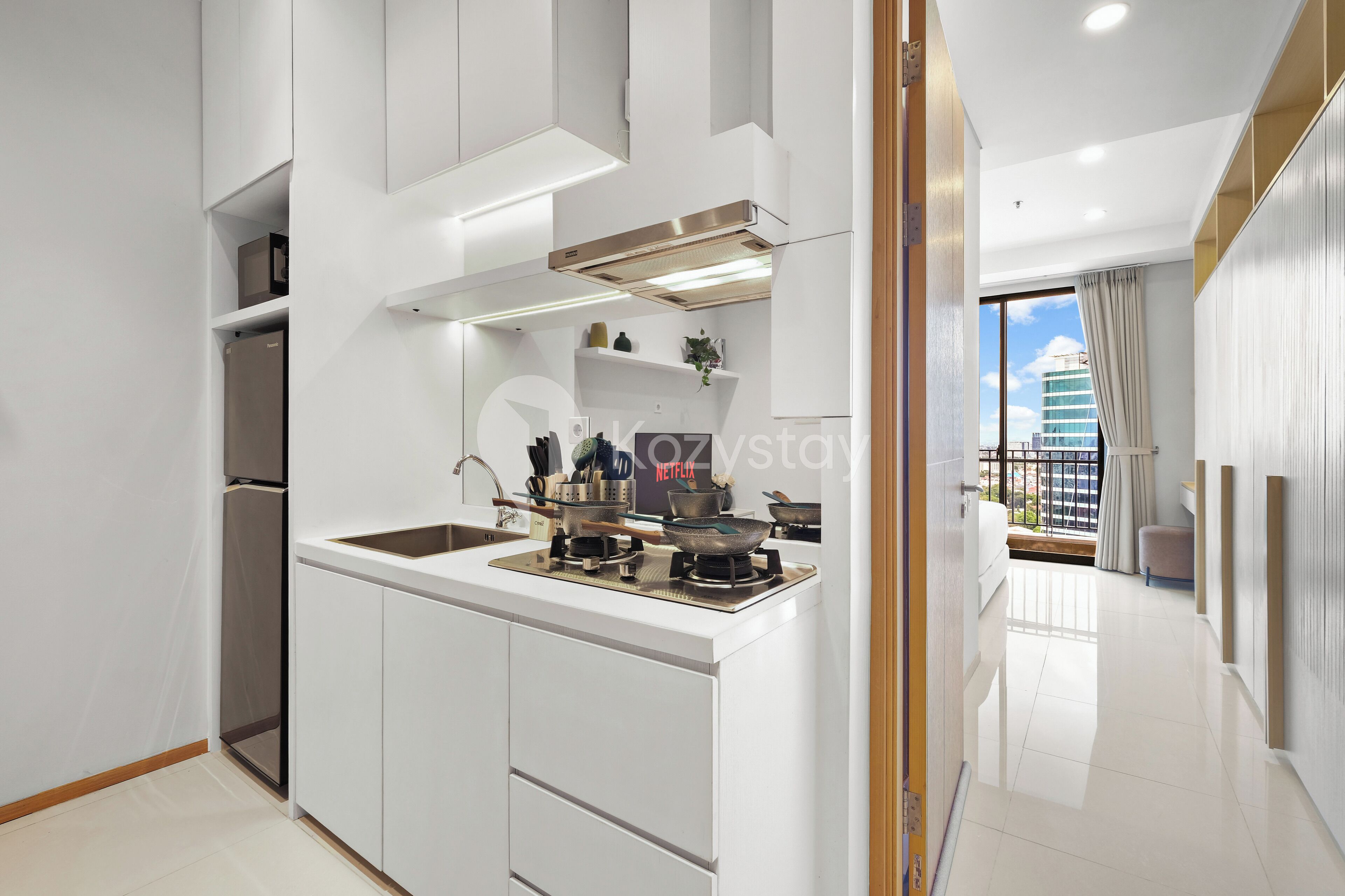 Apartamento, 1 quarto, vista para a cidade | Cozinha privada | Geladeira grande, micro-ondas, cooktop