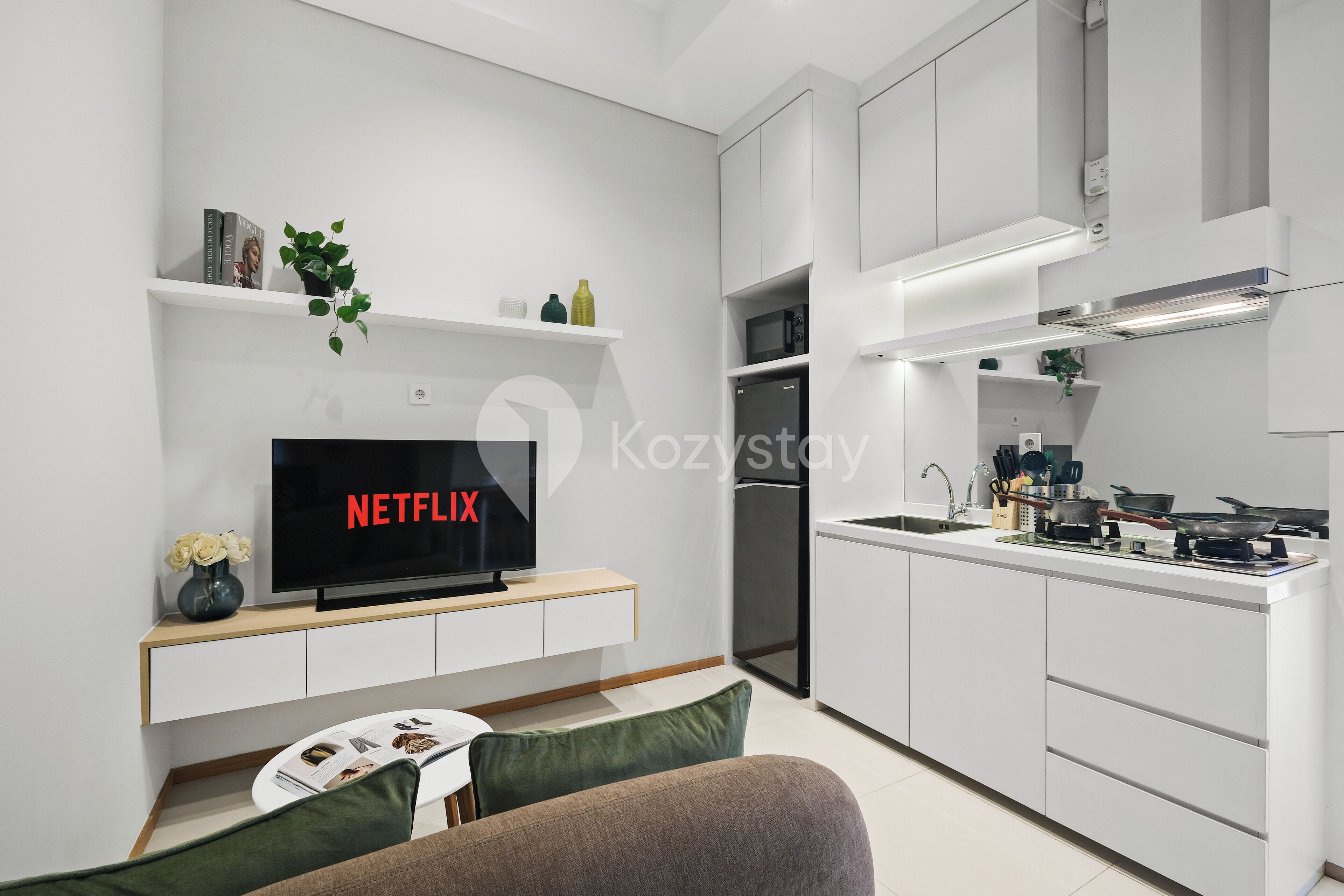 Apartamento, 1 quarto, vista para a cidade | Área de estar | Smart TV 43 polegadas com canais a cabo, Netflix, serviços de streaming