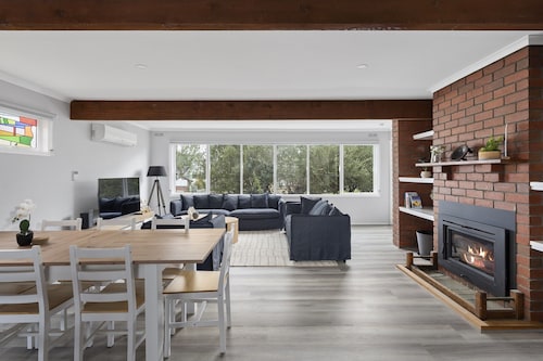 Family Retreat With Fireplace and Garden Views
