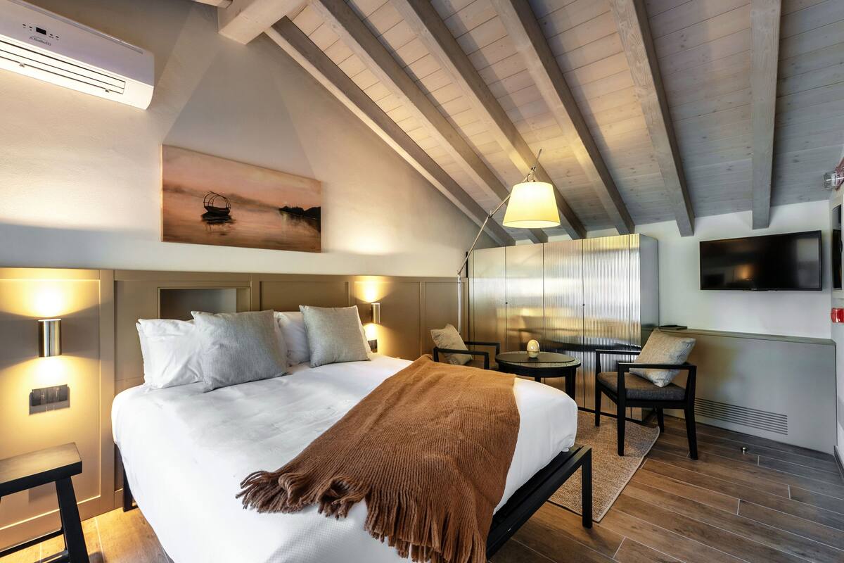 Appartement | Literie de qualité, couette en duvet, fer et planche à repasser