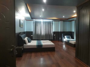 Camera Deluxe con letto matrimoniale o 2 letti singoli, vista giardino | Wi-Fi gratuito