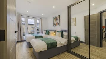 2 dormitorios, tabla de planchar con plancha, wifi y ropa de cama