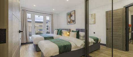 2 室のベッドルーム、アイロン / アイロン台、WiFi、ベッドシーツ