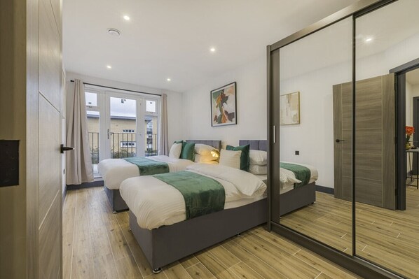 2 dormitorios, tabla de planchar con plancha, wifi y ropa de cama