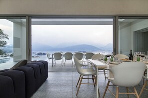 Villa, 4 Bedrooms, Private Pool, Garden View | Dining room - Modern Oasis Overlooking Lake Maggiore (Stresa)