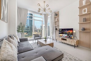 Luxury Apartment, Balcony, City View | Living area | 48-inch flat-screen TV with satellite channels - Nine Tower Suites By Hostiva (Dubai)