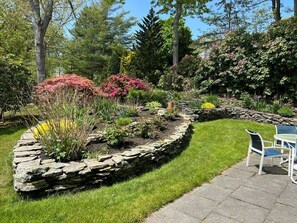 Outdoor dining - Three-bedroom house is nestled in a peaceful neighborhood and features a fully fenced yard. (Chatham)