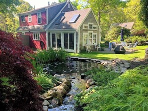 Property grounds - Three-bedroom house is nestled in a peaceful neighborhood and features a fully fenced yard. (Chatham)