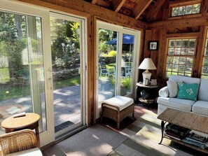 TV - Three-bedroom house is nestled in a peaceful neighborhood and features a fully fenced yard. (Chatham)