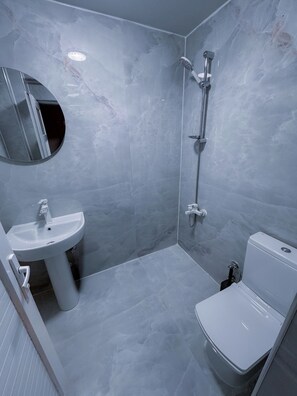 Classic Double Room, Balcony, City View | Bathroom | Shower, towels, soap, shampoo