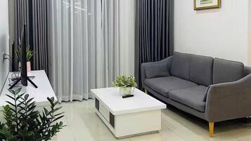 65-inch Smart TV with cable channels, fireplace, Netflix