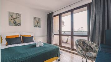 1 bedroom, desk, iron/ironing board, travel cot