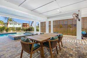 Outdoor dining - 211 Ostego - Island Time 4 Bedroom Home (Fort Myers Beach)