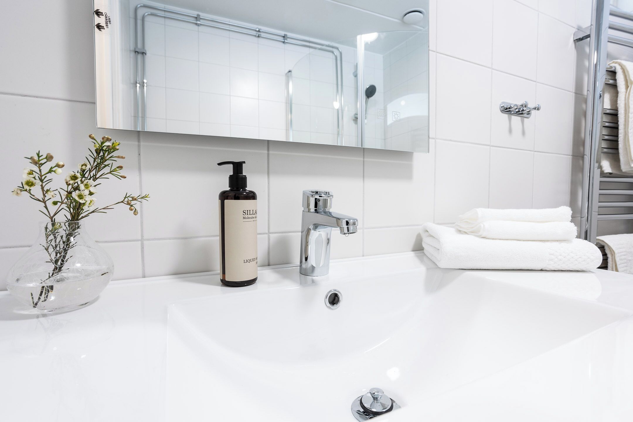 Dusj, håndklær og toalettpapir