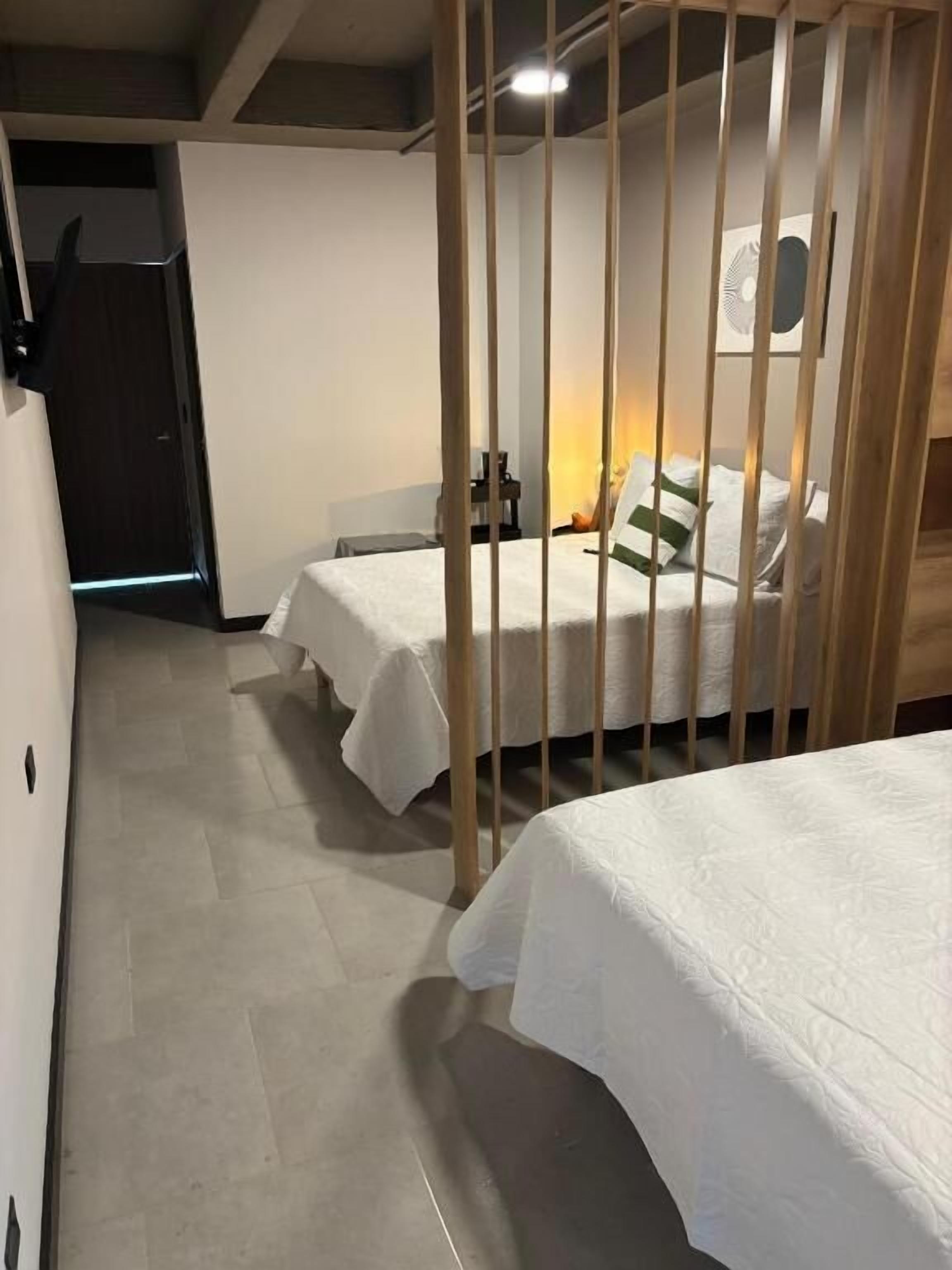 Premium bedding, down duvets, minibar, free WiFi